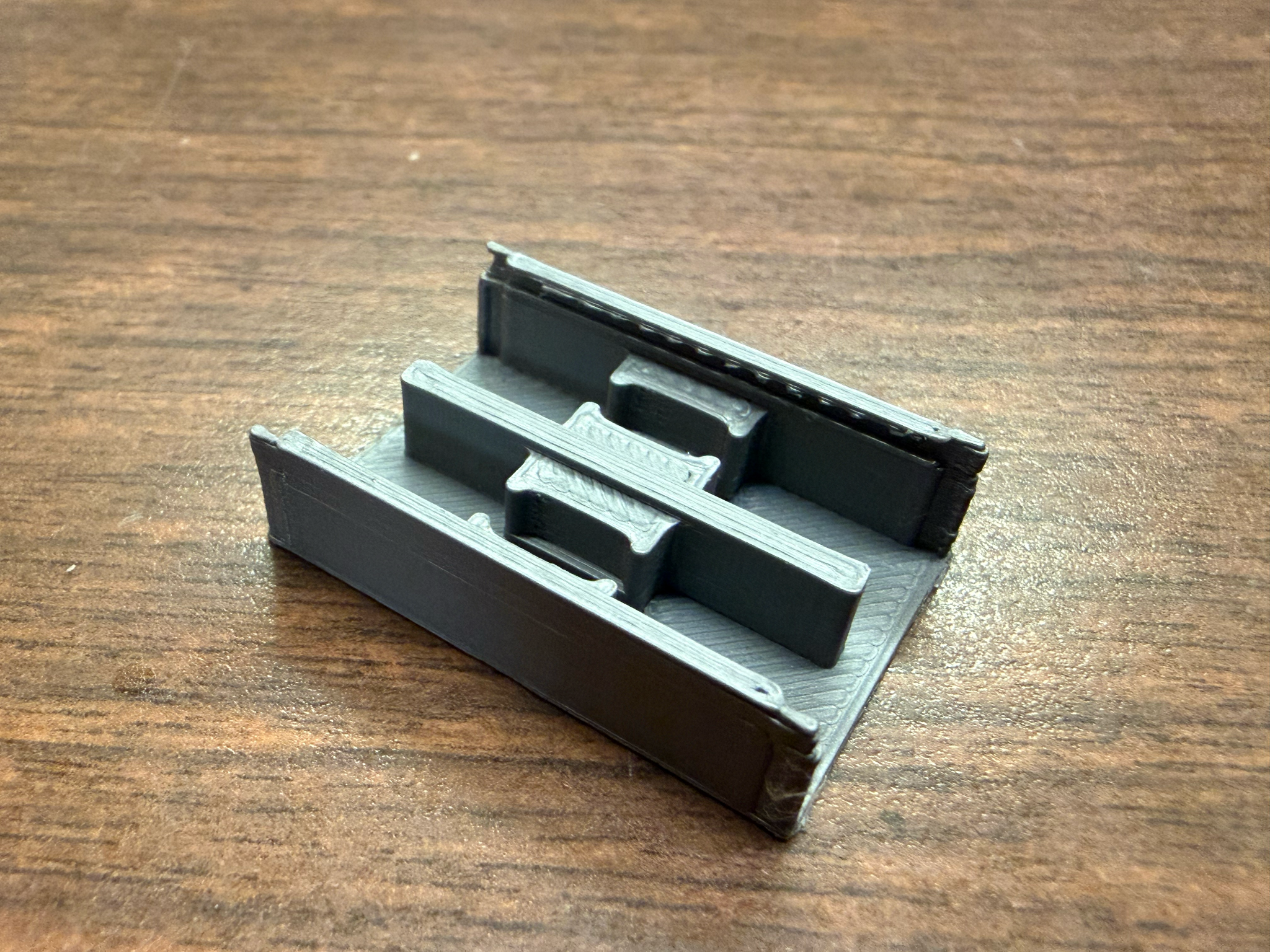 The printed dovetail wall for the laser enclosure